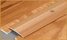 Пороги для ламината – виды, формы и материалы